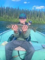 A person holding a fish in a boat AI-generated content may be incorrect. A person holding a fish in a boat AI-generated content may be incorrect.