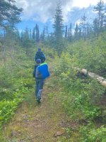 A group of people walking on a trail in the woods AI-generated content may be incorrect. A group of people walking on a trail in the woods AI-generated content may be incorrect.