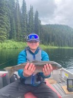 A person holding a fish in a boat AI-generated content may be incorrect. A person holding a fish in a boat AI-generated content may be incorrect.