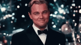 leonardo-di-caprio-cheers-to-all.gif